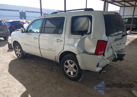 2011 Honda Pilot Touring z USA, uszkodzony, nr VIN 5FNYF3H93BB055942